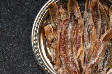 Anchovy fillet fish seafood snack aperitif fresh tasty food dish delicious gourmet food background on the table rustic food top view copy space pescetarian diet