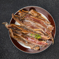 Anchovy fillet fish seafood snack aperitif fresh tasty food dish delicious gourmet food background on the table rustic food top view copy space pescetarian diet