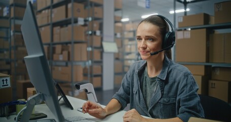 Warehouse of E-commerce online store or post office: Female customer support specialist in...