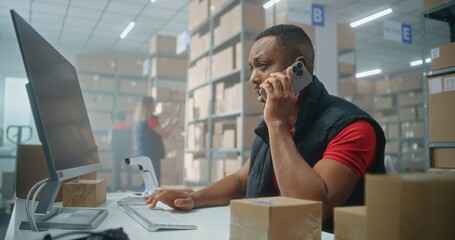 Warehouse retail facility of E-commerce store or postal service: African American logistics...
