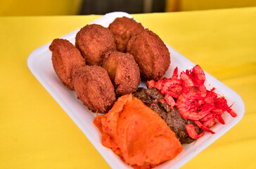 Acarajé. Traditional Brazilian food, made with vatapá, caruru and dried shrimp.