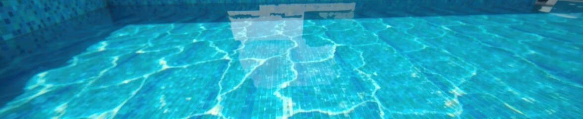 Glittering water reflections on a blue glittery summer pool background , water reflection, blue hues