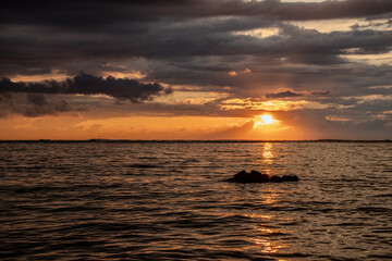 Naklejka premium sunset over the sea