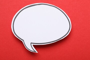 Blank speech bubble on red background. Space for text
