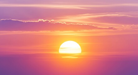 beautiful florescent sunset in the clouds of pink, orange and yellow. bright sun background, dawn or dusk, sunrise, pastel