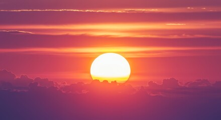 beautiful florescent sunset in the clouds of pink, orange and yellow. bright sun background, dawn or dusk, sunrise, pastel