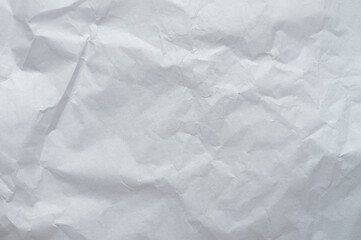 Crumpled white paper texture used for creative backgrounds and craft projects
