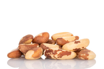 Several Brazil nuts, close-up, isolated on a white background.
