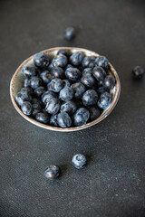 blueberry ripe juicy berries vitamins natural product snack fresh tasty food dish gourmet food background on the table rustic food top view copy space keto and paleo diet Vegetarian and vegan food