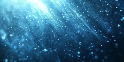 Fototapeta premium This stunning abstract background showcases radiant blue light rays and shimmering particles, ideal for themes highlighting advancements in science and technology, blending creativity and innovation