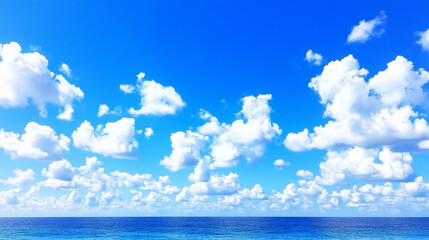 Azure Horizon:  A serene expanse of azure sky, adorned with cotton-candy clouds, seamlessly meets the tranquil expanse of the ocean.