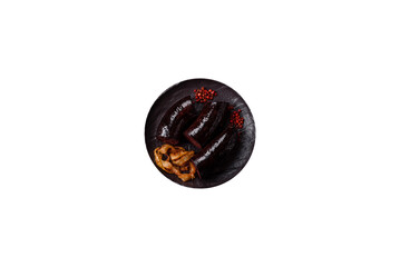 Delicious black blood sausage or black pudding with spices and herbs