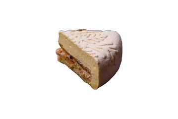 Piece of cheesecake with nuts and berries with winter pattern