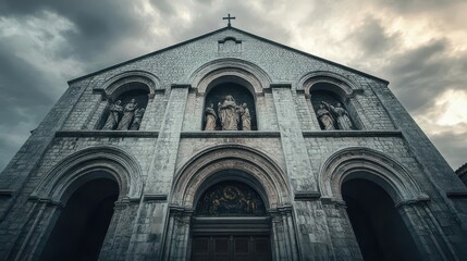 Fototapeta premium A Romanesque church with grand arches detailed carvings and a cloudy sky framing its bold silhouette
