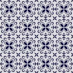Seamless pattern featuring intricate blue swirling motifs arranged in a symmetrical tiled layout on a light gray background, perfect for decor.