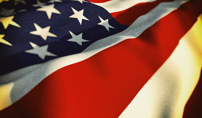 The waving American flag, a patriotic symbol of the United States, displays its iconic stars and stripes of red, white, and blue