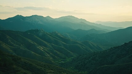 Majestic sunset mountain range panorama, layered hills, serene valley, travel postcard background.