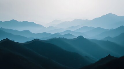 Obraz premium The Great Wall winds through misty blue mountains