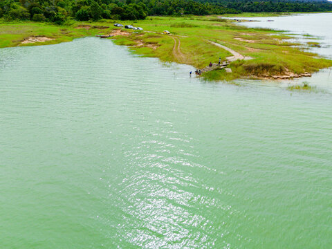 Panoramic aerial drone view of majestic lake at Tasik Pedu or Pedu Lake in Kuala Nerang, Kedah, Malaysia