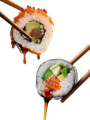 Two sushi roll elegantly displayed with chopsticks and a side of dipping sauce, ready to be enjoyed.