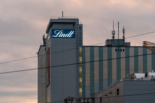 Kilchberg, Switzerland - December 8, 2024: Sunset view of the Lindt chocolate factory building