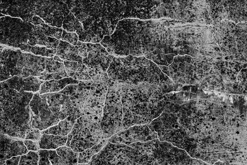 Hintergrund von einer alten Steinmauer in schwarz-weiß