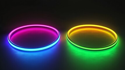 Fototapeta premium Two vibrant neon rings glow brightly in the dark