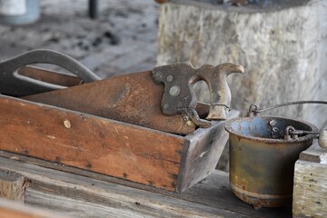 old rusty hand saw tool box vintage bucket