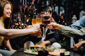 Cheers to Good Times: A group of friends raise their glasses in a warm and inviting toast, capturing the essence of genuine connection and shared celebration.  