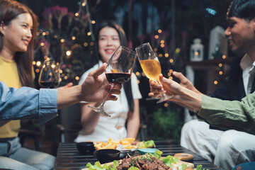 Nighttime Cheers: Friends Toast to Friendship 
