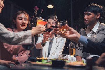 Nightlife Cheers: Friends Toast Success at a Chic Bar 