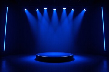 a dimly lit stage with blue lights and a round pedestal
