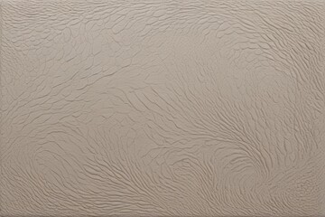 Obraz premium a close up of a wall with a pattern of sand on it