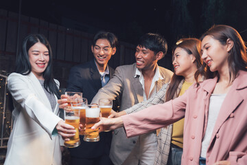 Cheers to Friendship: A group of stylish young adults raise a toast, their laughter and camaraderie palpable in this vibrant nightlife scene.  Enjoy the energy and connection. 