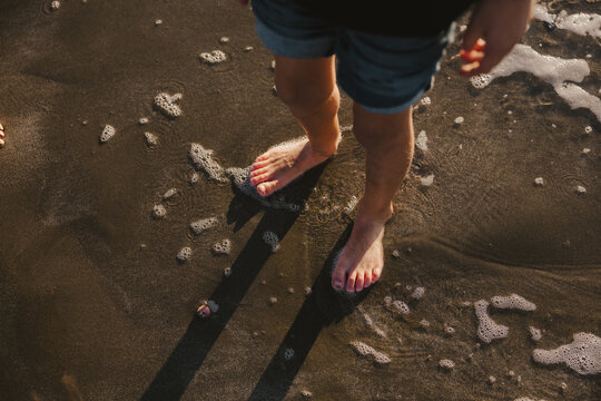 Kids Feet in the Waves