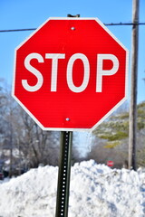 Stop Sign by Snow Bank