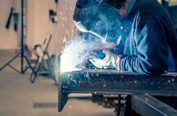 Welder, craftsman, assembly of iron, steel and other metals. Industrial steel welding technician in...