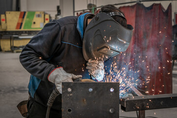 Welder, craftsman, assembly of iron, steel and other metals. Industrial steel welding technician in...