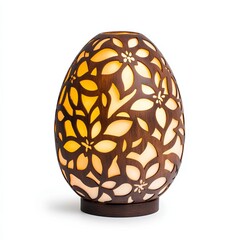 Decorative egg-shaped lantern with laser-cut floral patterns glowing softly isolated on a white background 