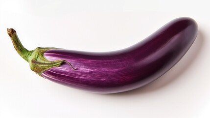 single curvy violet eggplant angled on bright surface featuring green stem balanced form copyspace concept of cooking produce farm fresh marketing