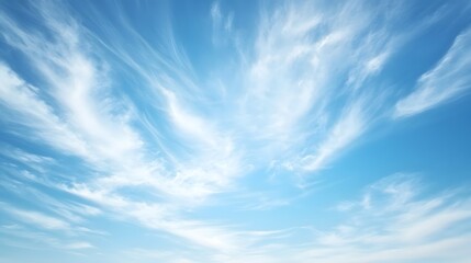 Serene Blue Sky With Wispy White Clouds
