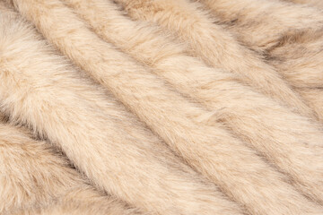 Texture of faux fur as a background, top view.
