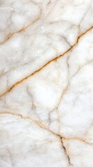 a close up of a white and gold marble surface