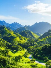 Fototapeta premium Scenic winding road through lush green mountains and valleys, with a herd of sheep grazing peacefully in the vibrant meadow.