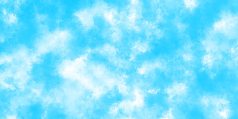 Cloudy and grunge brush painted blue sky Watercolor background, painted mottled blue Grunge aquarelle painted blue sky texture. Soft and cloudy blue sky Watercolor background texture