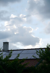 solar energy  roof and nature, dramatic atmosphere, with white tones