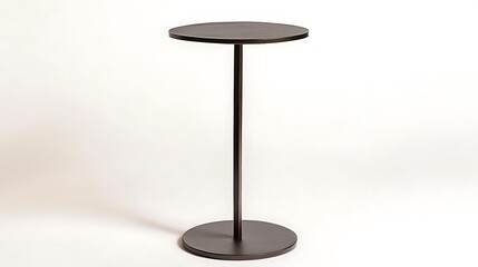 A black table with a round top and a metal pole