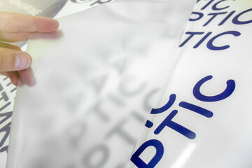 Transparent mounting film for gluing vinyl film.Gluing of plotter cutting in the production of...
