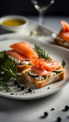 Elegant salmon canap&eacute;s served on artisanal bread with a dollop of cream and fresh greens. Perfect for gourmet appetizers, events, and creative culinary presentations, these treats highlight freshness 