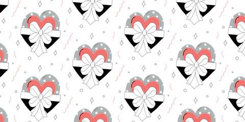Seamless pattern of pink and gray heart-shaped gift boxes with white ribbons and polka dots. Valentine's Day illustration